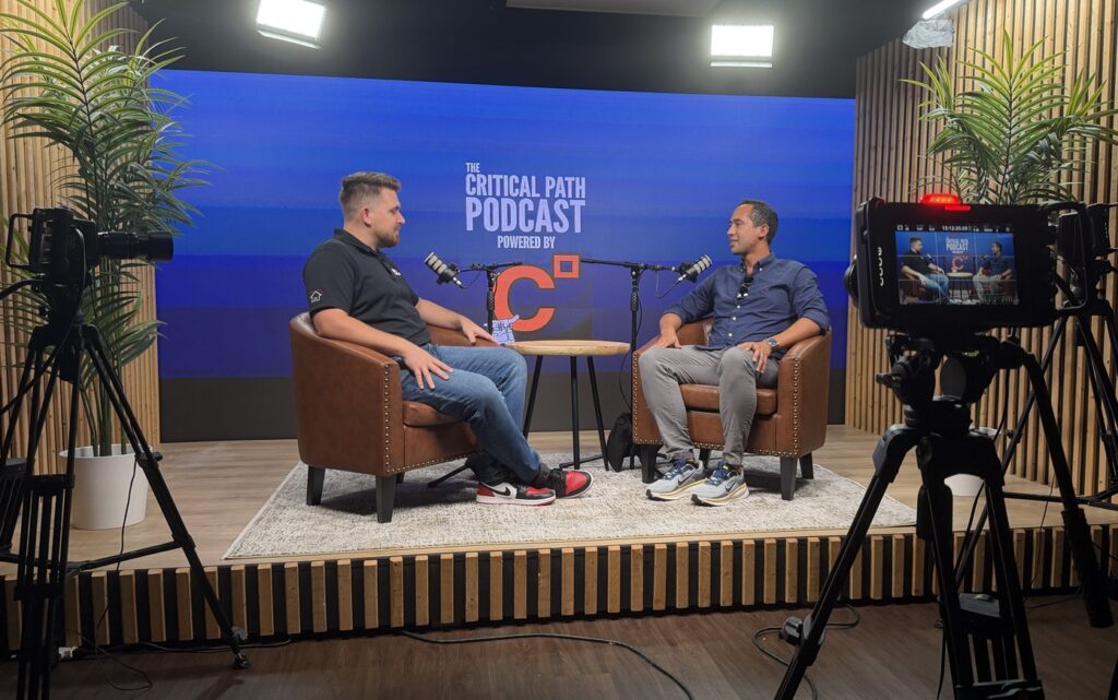 Two men on a podcast set